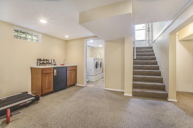 2147 Academy Dr NE, Grand Rapids, MI 49503 - indoor wet bar with separate washer and dryer, light carpet, stairs, recessed lighting, and refrigerator