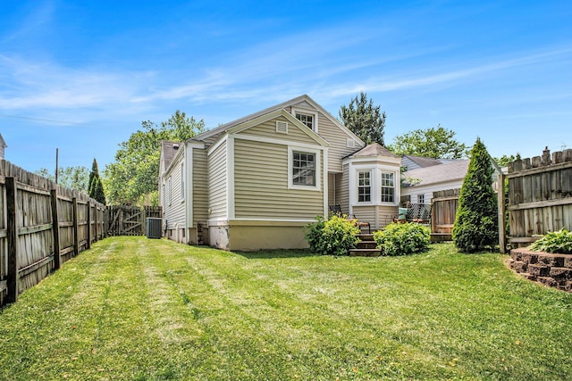 2147 Academy Dr NE, Grand Rapids, MI 49503 - rear view of house with cooling unit