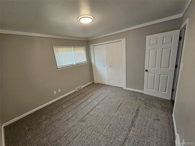 21222 Audrey Ave, Sterling Heights, MI 48091 - unfurnished bedroom featuring carpet floors, a closet, and ornamental molding