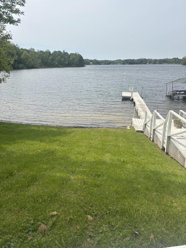 00320 3850th St, Bloomingdale, MI 49026 - dock area with a water view and a yard