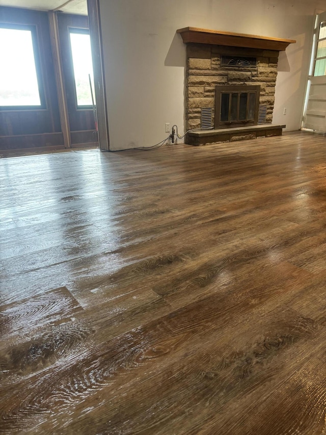 00320 3850th St, Bloomingdale, MI 49026 - unfurnished living room featuring wood finished floors and a fireplace