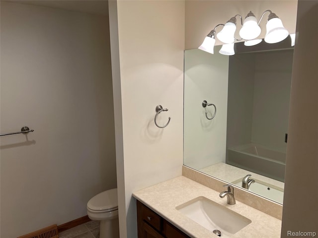 2205 Hammond Place Ctr, Traverse City, MI 49686 - bathroom featuring vanity, toilet, and tile patterned flooring