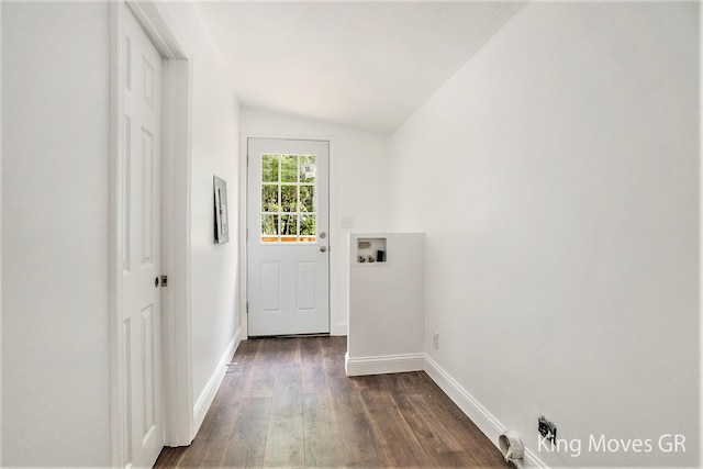 11690 21 Mile Rd NE, Sand Lake, MI 49343 - entryway with lofted ceiling, dark wood-style flooring, and baseboards