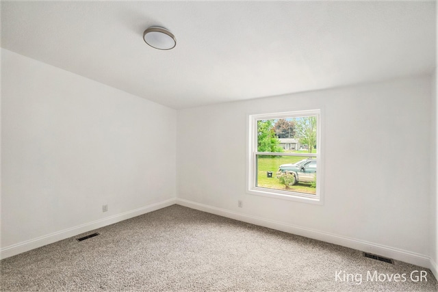 11690 21 Mile Rd NE, Sand Lake, MI 49343 - carpeted empty room featuring baseboards