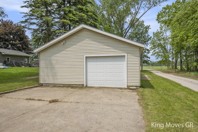 11690 21 Mile Rd NE, Sand Lake, MI 49343 - detached garage featuring driveway