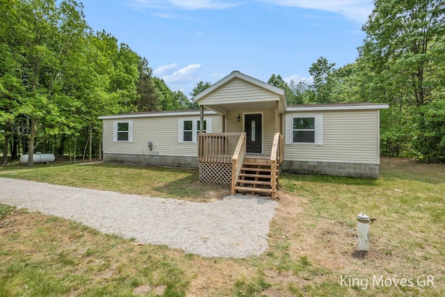 11690 21 Mile Rd NE, Sand Lake, MI 49343 - manufactured / mobile home with a front yard