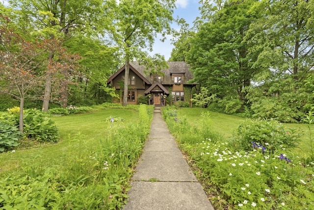 1706 S University Ave, Ann Arbor, MI 48104 - view of front of home with a front yard and stucco siding