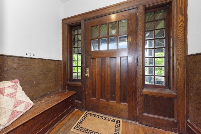 1706 S University Ave, Ann Arbor, MI 48104 - entryway featuring wood finished floors and a wainscoted wall