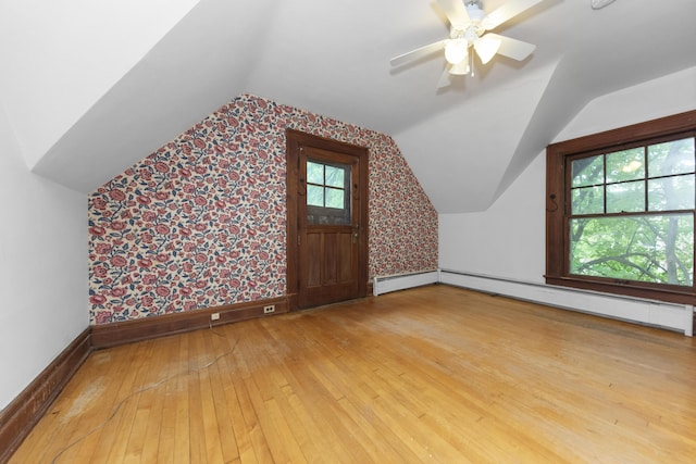 1706 S University Ave, Ann Arbor, MI 48104 - bonus room featuring hardwood / wood-style flooring, wallpapered walls, baseboards, vaulted ceiling, and ceiling fan