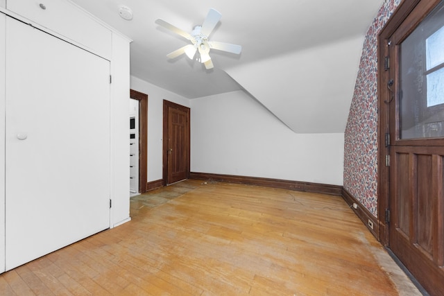 1706 S University Ave, Ann Arbor, MI 48104 - bonus room featuring light wood-style floors, vaulted ceiling, baseboards, and a ceiling fan