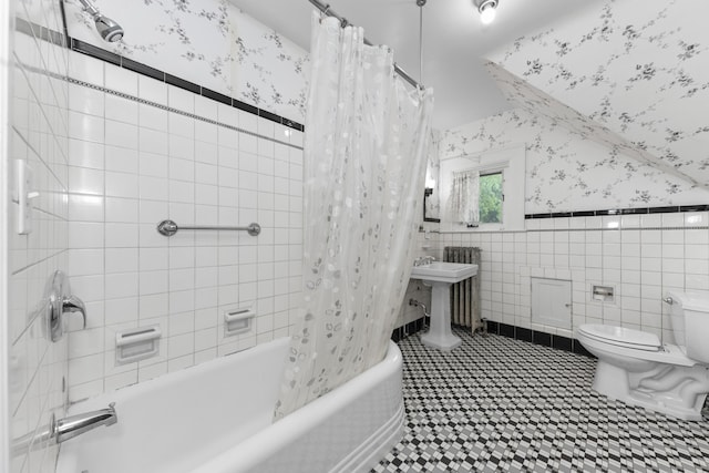 1706 S University Ave, Ann Arbor, MI 48104 - bathroom with shower / tub combo with curtain, toilet, tile walls, and wallpapered walls