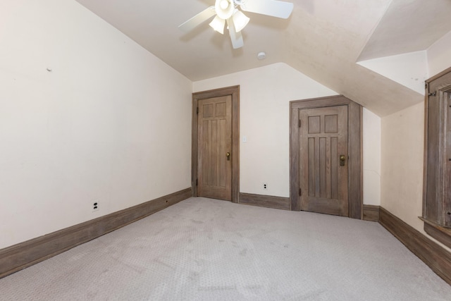 1706 S University Ave, Ann Arbor, MI 48104 - additional living space featuring lofted ceiling, a ceiling fan, light carpet, and baseboards