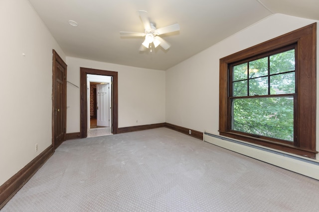 1706 S University Ave, Ann Arbor, MI 48104 - empty room with baseboard heating, light carpet, a ceiling fan, and baseboards