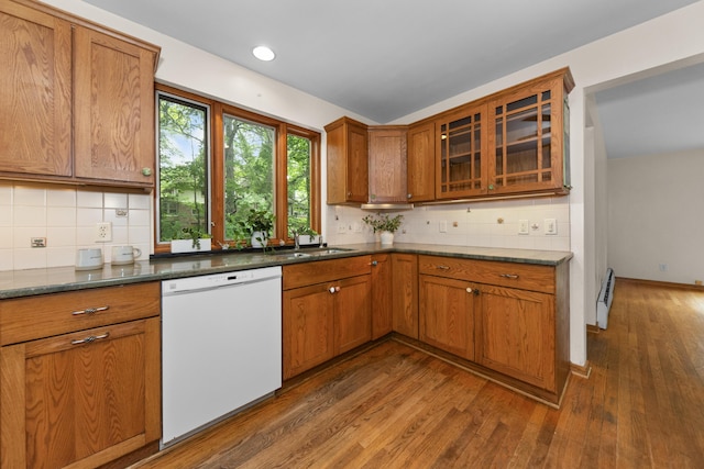 1706 S University Ave, Ann Arbor, MI 48104 - kitchen with white dishwasher, dark wood finished floors, brown cabinetry, tasteful backsplash, and recessed lighting