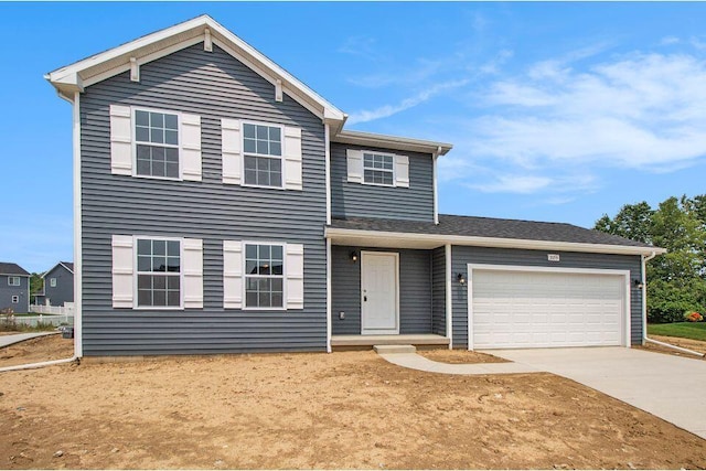 25245 Vargas Ln, Mattawan, MI 49071 - view of front facade featuring concrete driveway and an attached garage