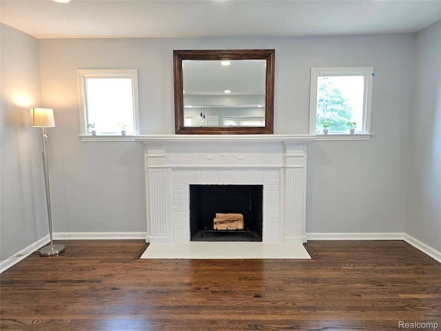 13965 Norborne, Redford, MI 48239 - unfurnished living room featuring dark wood-style floors, a fireplace, and baseboards