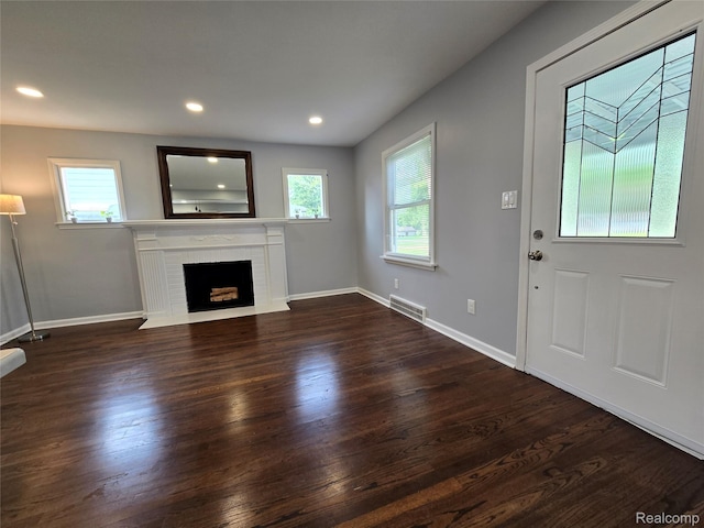 13965 Norborne, Redford, MI 48239 - unfurnished living room featuring wood finished floors, a fireplace, baseboards, and recessed lighting
