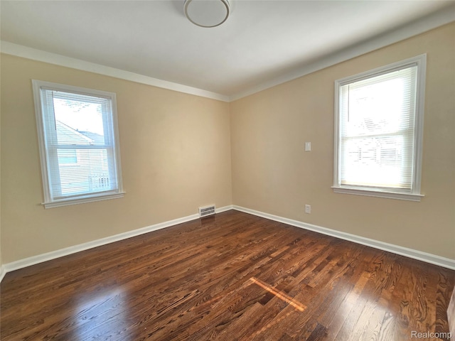 13965 Norborne, Redford, MI 48239 - unfurnished room with dark wood finished floors, baseboards, and ornamental molding
