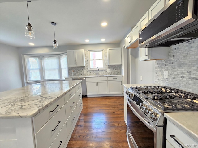 13965 Norborne, Redford, MI 48239 - kitchen with appliances with stainless steel finishes, a sink, decorative backsplash, white cabinets, and recessed lighting