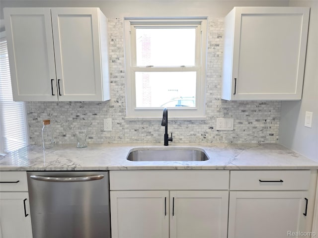 13965 Norborne, Redford, MI 48239 - kitchen with dishwasher, a sink, backsplash, and white cabinetry