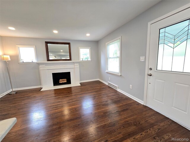 13965 Norborne, Redford, MI 48239 - unfurnished living room featuring dark wood-style floors, a fireplace, baseboards, and recessed lighting