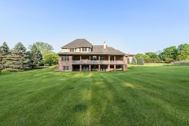 4297 Upper Glade Ct, Ann Arbor, MI 48103 - rear view of property featuring a lawn, a chimney, and a deck