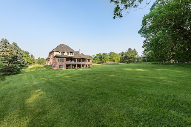 4297 Upper Glade Ct, Ann Arbor, MI 48103 - view of grassy yard featuring a wooden deck