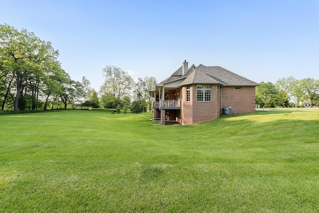 4297 Upper Glade Ct, Ann Arbor, MI 48103 - view of grassy yard featuring central AC