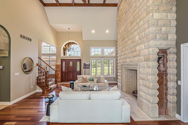 4297 Upper Glade Ct, Ann Arbor, MI 48103 - living area with a high ceiling, healthy amount of natural light, baseboards, stairs, and wood finished floors