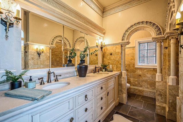 4297 Upper Glade Ct, Ann Arbor, MI 48103 - full bath with double vanity, toilet, and ornamental molding
