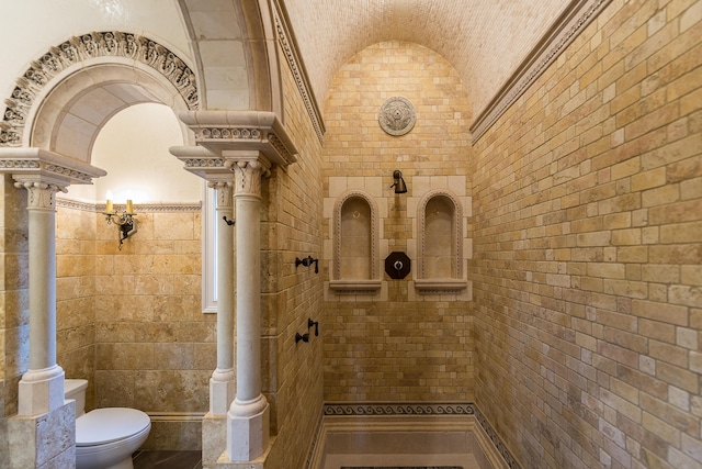 4297 Upper Glade Ct, Ann Arbor, MI 48103 - wine area featuring vaulted ceiling