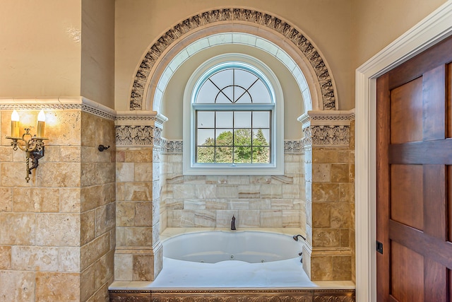 4297 Upper Glade Ct, Ann Arbor, MI 48103 - full bath with tile walls, a jetted tub, and wainscoting