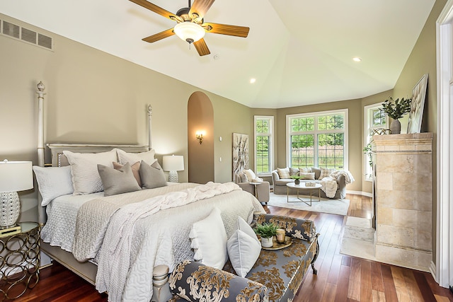 4297 Upper Glade Ct, Ann Arbor, MI 48103 - bedroom featuring arched walkways, dark wood-style floors, lofted ceiling, recessed lighting, and ceiling fan