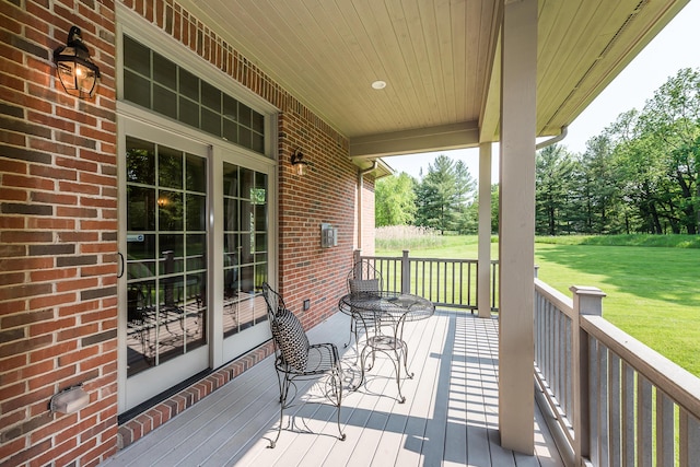 4297 Upper Glade Ct, Ann Arbor, MI 48103 - wooden porch featuring a yard