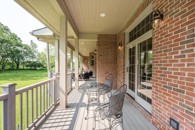 4297 Upper Glade Ct, Ann Arbor, MI 48103 - wooden porch with a lawn