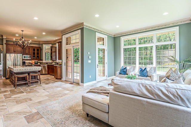 4297 Upper Glade Ct, Ann Arbor, MI 48103 - living area with a chandelier, ornamental molding, recessed lighting, baseboards, and stone tile flooring