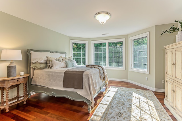 4297 Upper Glade Ct, Ann Arbor, MI 48103 - bedroom featuring wood finished floors and baseboards