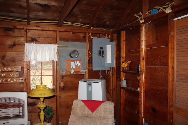 94 E Cherry Creek Rd, Mio, MI 48647 - kitchen with electric panel, heating unit, wooden walls, and vaulted ceiling