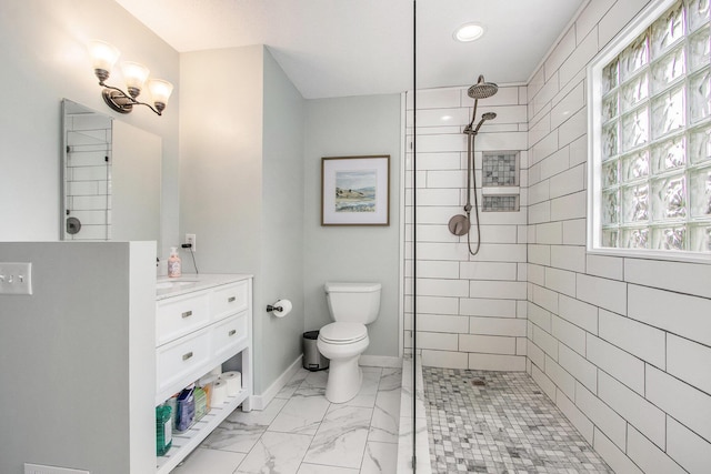 5616 Stoney Brook Rd, Kalamazoo, MI 49009 - bathroom featuring a walk in shower, toilet, vanity, marble look tiles, and plenty of natural light