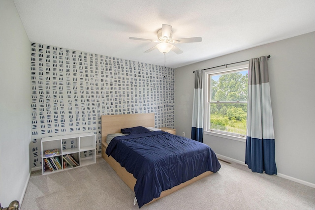 5616 Stoney Brook Rd, Kalamazoo, MI 49009 - bedroom featuring baseboards, a ceiling fan, and carpet