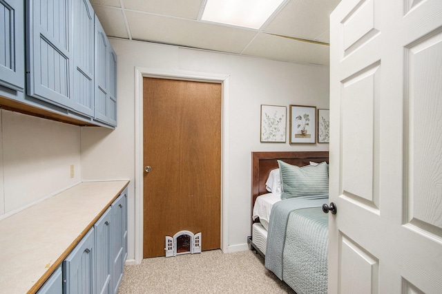 5616 Stoney Brook Rd, Kalamazoo, MI 49009 - bedroom featuring light colored carpet and a paneled ceiling