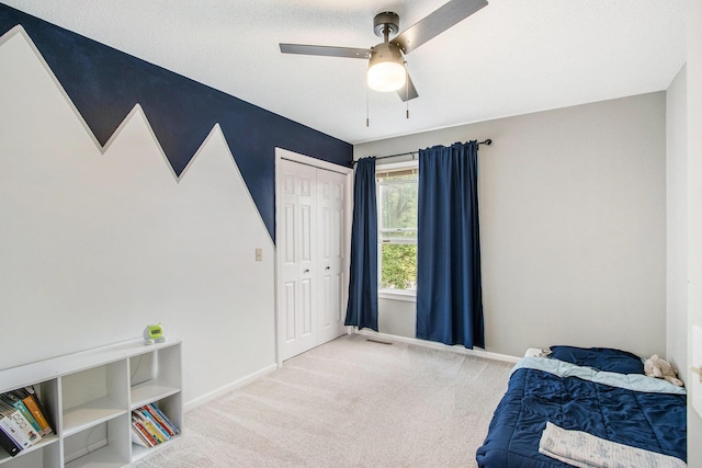 5616 Stoney Brook Rd, Kalamazoo, MI 49009 - carpeted bedroom featuring a closet, ceiling fan, and baseboards