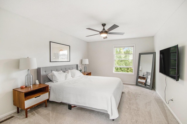 5616 Stoney Brook Rd, Kalamazoo, MI 49009 - bedroom with light carpet, baseboards, and ceiling fan