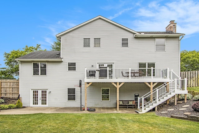 5616 Stoney Brook Rd, Kalamazoo, MI 49009 - rear view of house with french doors, a chimney, a patio area, a wooden deck, and stairway