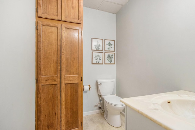 5616 Stoney Brook Rd, Kalamazoo, MI 49009 - half bath featuring vanity, toilet, and baseboards