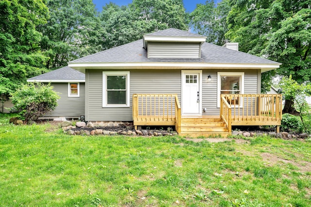 925 133rd Ave, Wayland, MI 49348 - view of front facade featuring a chimney, roof with shingles, and a deck