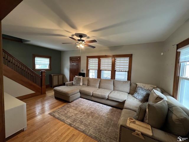 5304 E Dunbar Rd, Monroe, MI 48161 - living area featuring healthy amount of natural light, ceiling fan, light wood-type flooring, and stairs