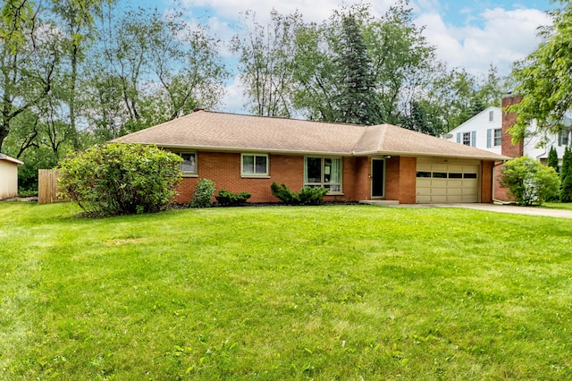 1110 Piccadilly Rd, Kalamazoo, MI 49006 - single story home featuring an attached garage, driveway, and brick siding