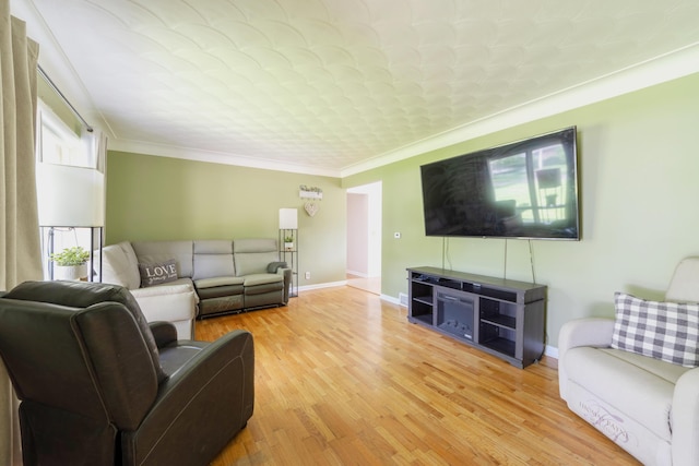 1110 Piccadilly Rd, Kalamazoo, MI 49006 - living room with light wood-type flooring, crown molding, and baseboards