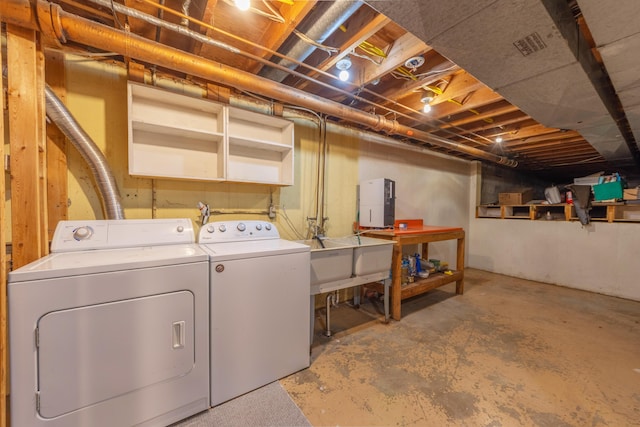 1110 Piccadilly Rd, Kalamazoo, MI 49006 - unfinished below grade area with washing machine and dryer and a sink